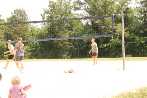 The three year old spent much of his time laying in the middle of the volleyball court.  It didn't even phase the big kids.  They just played around him.