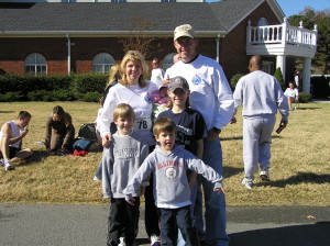 Here's a picture from my very first 10 miler 10 years ago. Those two little boys are now taller than me and have gown up to love running. 
